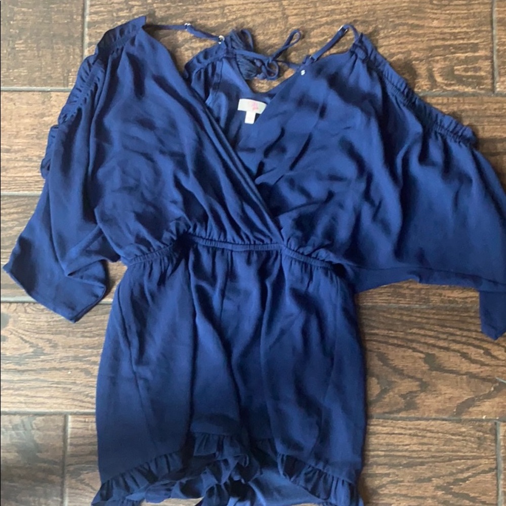 long sleeve romper with little cuts in the sleeves